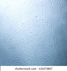 Water droplets on the glass with a colored background. Drops of water. - Shutterstock ID 132473807