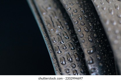 Water Droplets On The Rubber Membrane. Waterproofing...  Close-up Selective Focus Area.