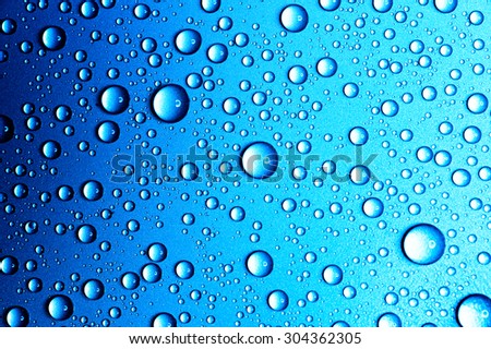 Water drops close up. Abstract Blue background of waterdrops, droplets