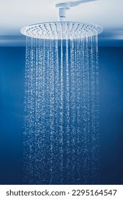 water drops falling from large rain shower head - Shutterstock ID 2295164547