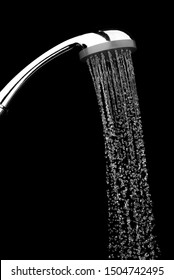 Water Drops Flowing From Shower Head In Bathroom On Black Background ,stop Motion 