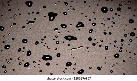 Water drops on the black background.