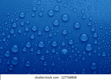 Water Drops On Blue Background