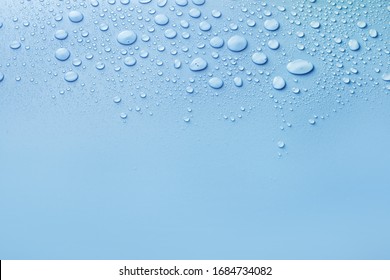 Water Drops On Blue Background