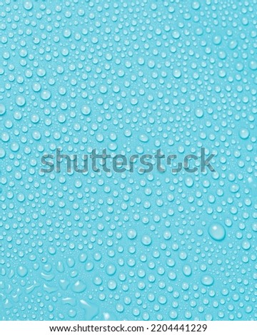 water drops on a blue background close-up