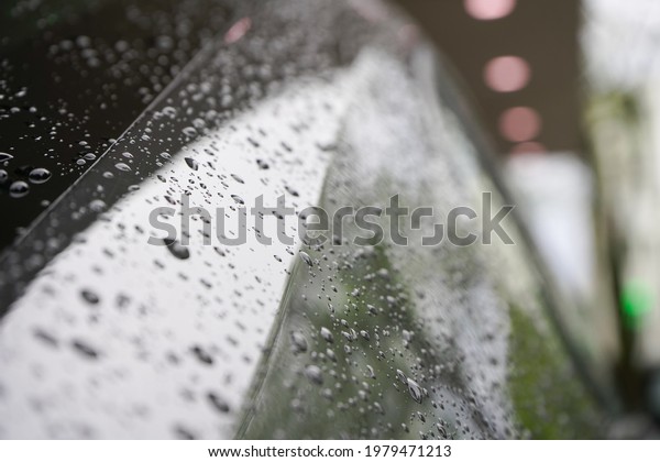 water drops. water drops on the body of a car. photo\
during the day.