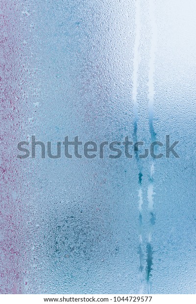 Water drops\
on car glass rain drops on clear\
window