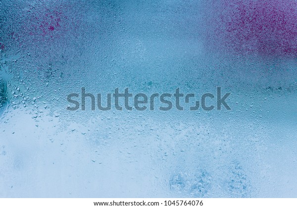 Water drops\
on car glass rain drops on clear\
window