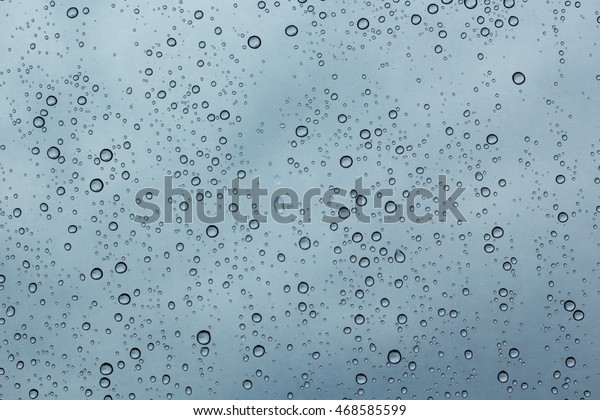 Water drops
on car glass.rain drops on clear
window