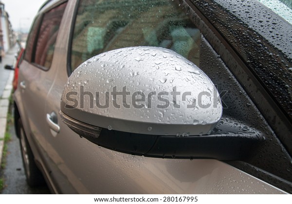water drops on car\
mirror