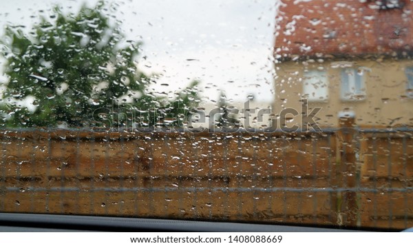 Water drops on a car\
window