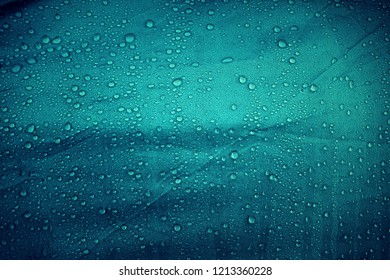 Water drops on the fabric - Shutterstock ID 1213360228