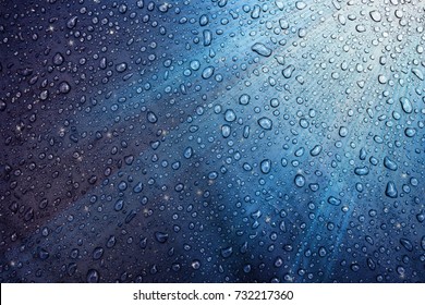 Water drops on the fabric. Abstract background