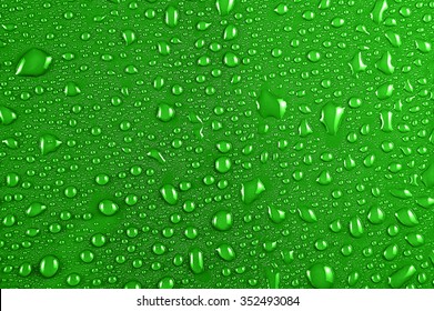 Water Drops On Green Background