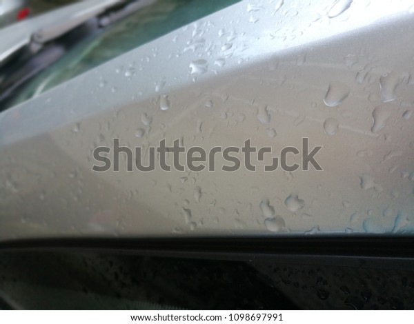 Water Drops on grey Car\
Hood
