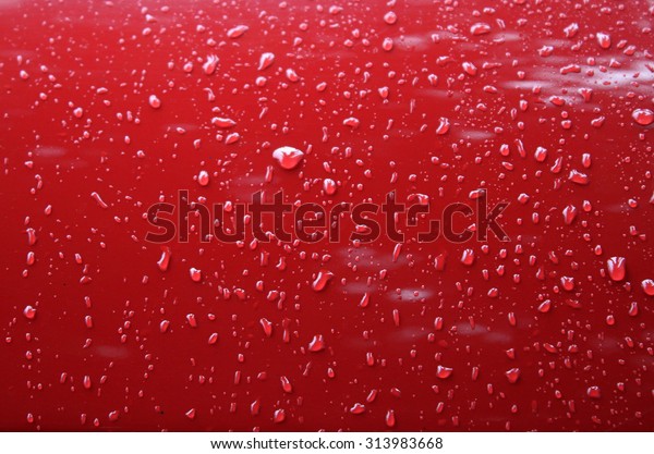 Water drops on metal car surface after water\
protection repellent\
coating