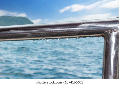 Water drops on the metal railing of the boat - Powered by Shutterstock