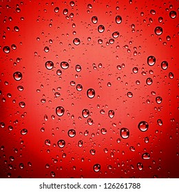 Water Drops On Red Background