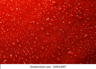 Water Drops On Red Background