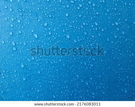 Water drops on waterproof membrane fabric. Morning dew on tent.