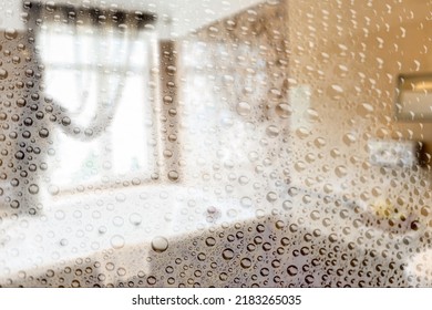 Water Drops On Wet Glass Shower Door In Hotel Bathroom. Travel, Holiday, Vacation, Interior Design, Body Care