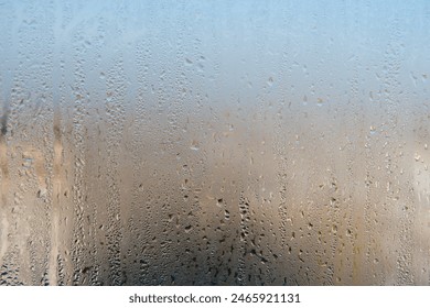 Water drops on the window, natural background, closeup of photo - Powered by Shutterstock