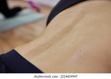 Water Drops On The Woman Skin. Human Skin And Sweat. Close Up Of Wet Human Skin.