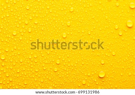 water drops on a yellow background