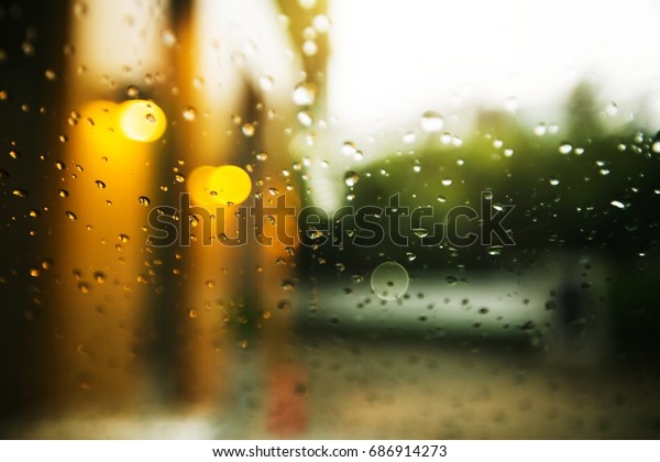 water drops rain on\
window glass car.
