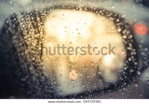 Water drops steam on car window glass background ,\
process in vintage style