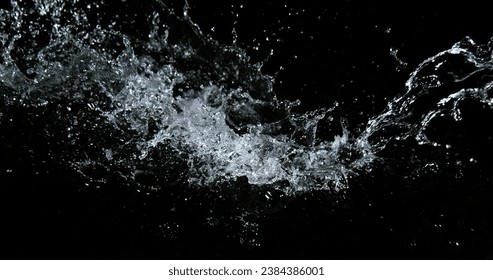 Water Exploding and Splashing against Black Background