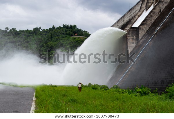 Water falling from the\
spillway of the concrete dam, it is overflow way of over-water in\
rainy season.