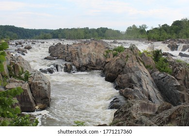 Water Falls Rushing Through Rocks.