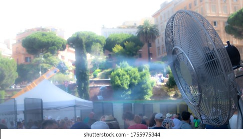 A Water Fan Blowing Air Fresh During A Very Hot Weather In Rome