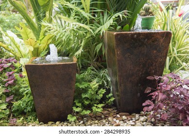 water feature in garden is Chinese belief   fountain from pot  put on right front of house is lucky - Shutterstock ID 284298935