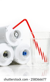 Water Filters And Glass Of Water With Drinking Straw.