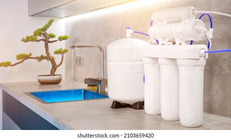 water filtration system. Home water purification filter. High quality photo - Shutterstock ID 2103659420