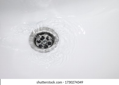 Water Flow Into Drain In Bath
