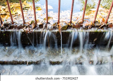 Water Flowing Down A Drain