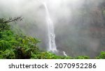 Water flowing downstream at LINGMALA WATER FALLS, with Mist and Clouds floating around, PANCHGANI, MAHARASHTRA, INDIA