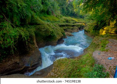 Water flows downstream to Devi's Falls in Pokhara, Nepal