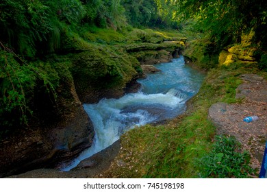 Water flows downstream to Devi's Falls in Pokhara, Nepal
