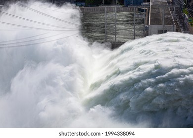 Water flows in a hydroelectric power plant. Electricity production, ecology, climate change.