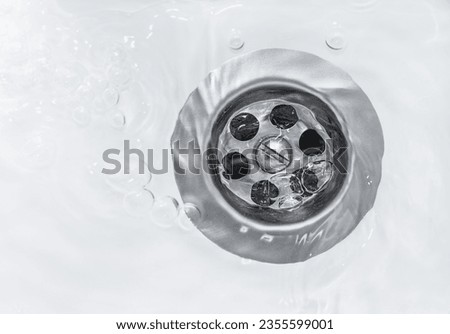 water flows into an open sewer, top view
