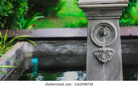 Water flows out of the pipe or the water flows out of the faucet. - Shutterstock ID 1161948718