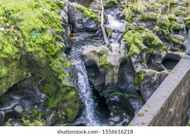 Water flows over solid rock at Tumwater Fall park in washington State.