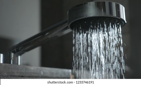 Water Flows From The Shower Close Up.