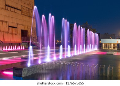 Water Fountain At European Solidarity Centre In Gdansk At Night.