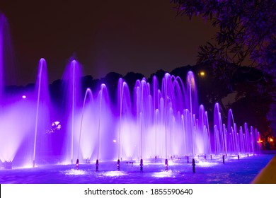 Water Fountain Illuminated At Night In Parque Grande Or Parque José Antonio Labordeta In Zaragoza, Spain