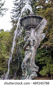 Water Fountain Statue Of An Angel Holding A Woman